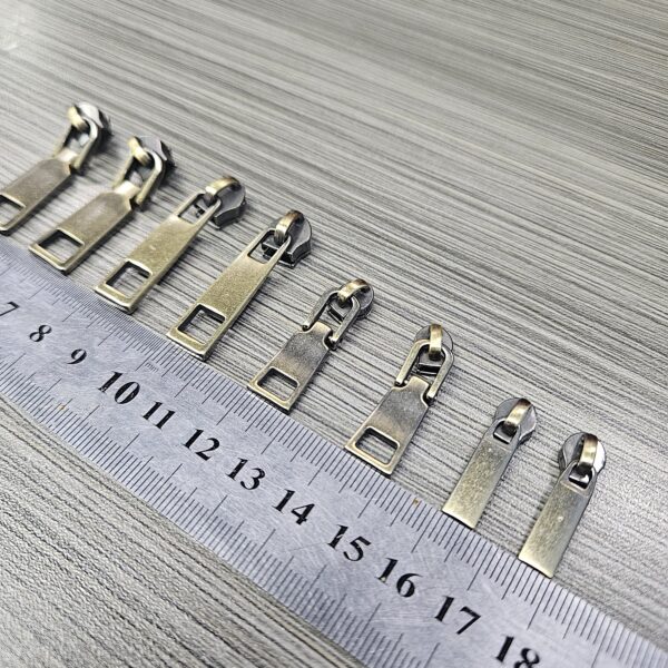 Custom Made Clothing Metal Zipper Slider Tape Antique Brass Jacket Zipper Puller Zinc Alloy Nylon Head for Handbags Logo Blanks colored zinc alloy zipper pull cover artifact pull lock head universal quilt special zipper accessories (复制)