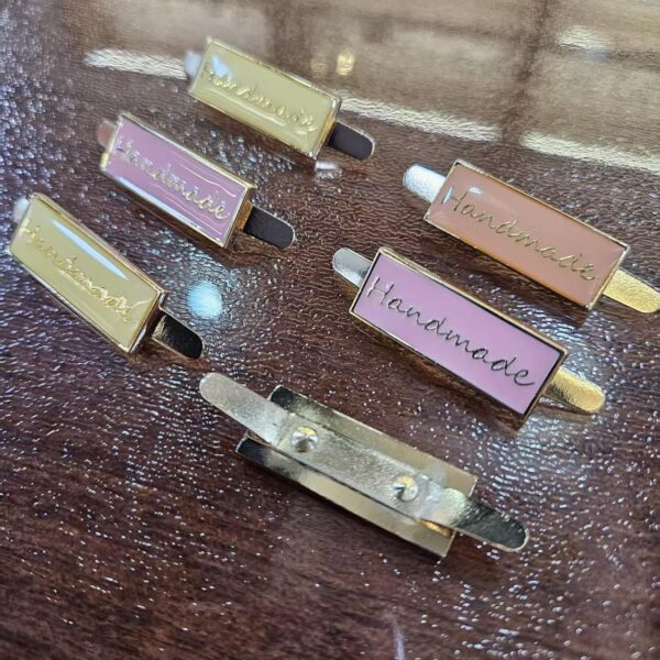 Custom logo hang Tag With Soft Enamel Small Metal Brand Engraved Jewelry Charm Pendant embossed logo custom metal fastener for garments brand gold custom tags metal clothing (复制)