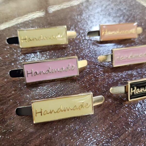 Custom logo hang Tag With Soft Enamel Small Metal Brand Engraved Jewelry Charm Pendant embossed logo custom metal fastener for garments brand gold custom tags metal clothing (复制)