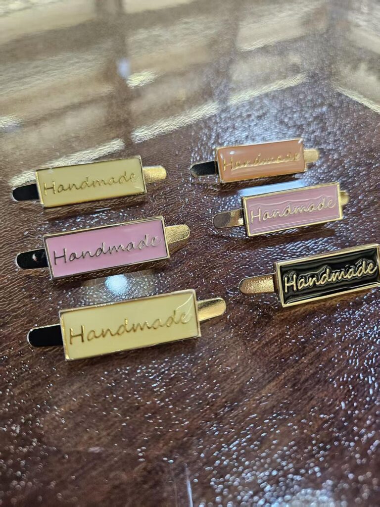Home embossed logo custom metal fastener for garments brand gold custom tags metal clothing (复制)