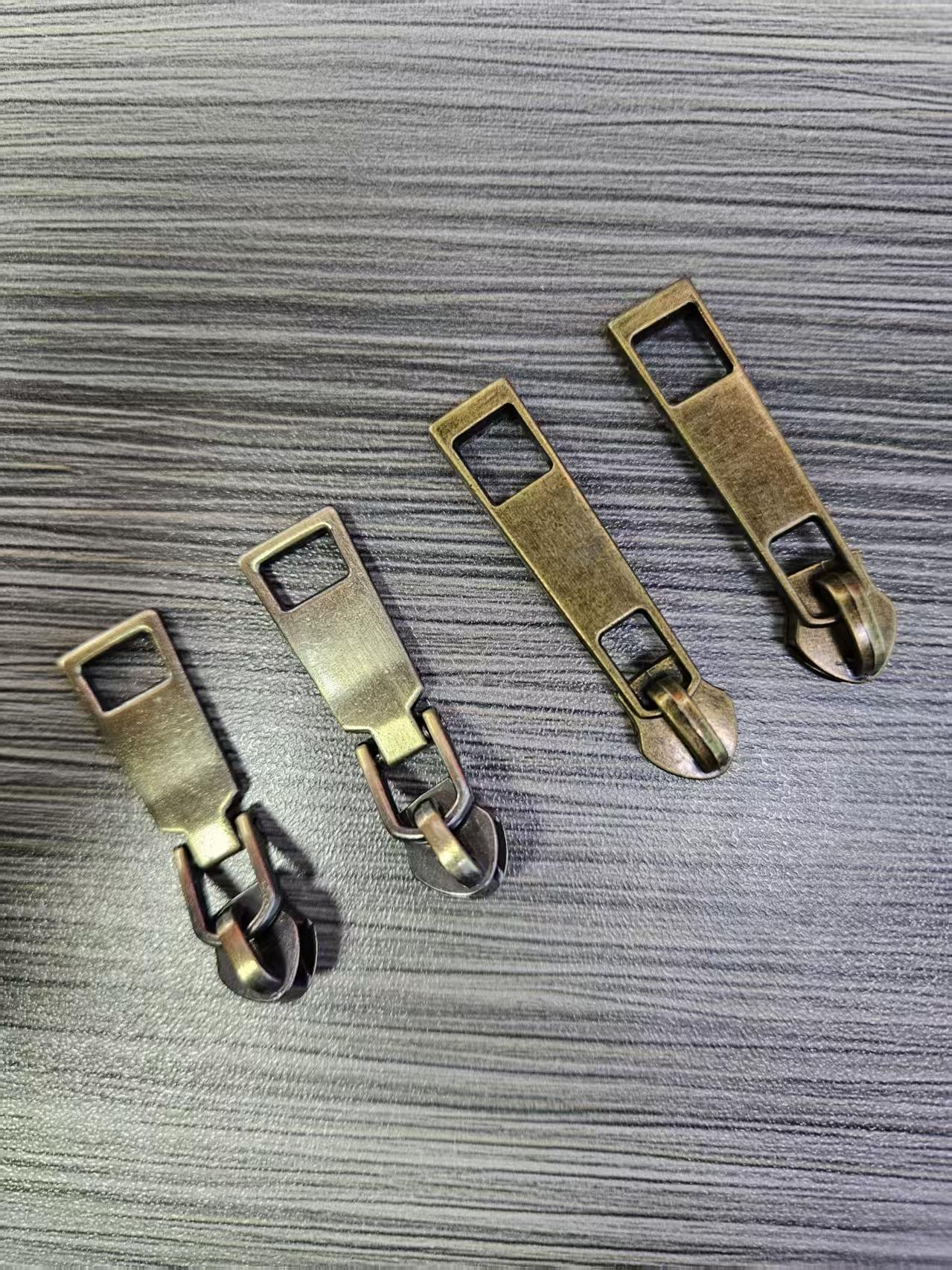 manufacturer wholesale price custom logo 3# 5 # 7# zipper puller head multiple styles metal zipper slider for clothing bag (复制) manufacturer wholesale price custom logo 3# 5 # 7# zipper puller head multiple styles metal zipper slider for clothing bag (复制)