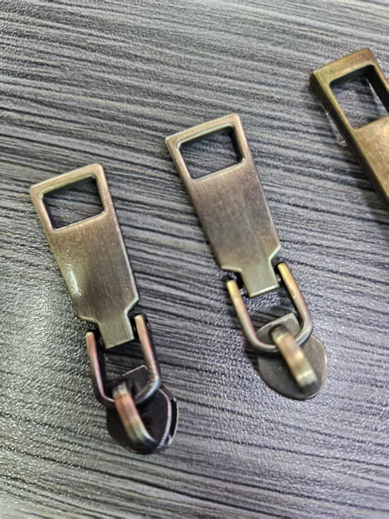 manufacturer wholesale price custom logo 3# 5 # 7# zipper puller head multiple styles metal zipper slider for clothing bag (复制) manufacturer wholesale price custom logo 3# 5 # 7# zipper puller head multiple styles metal zipper slider for clothing bag (复制)