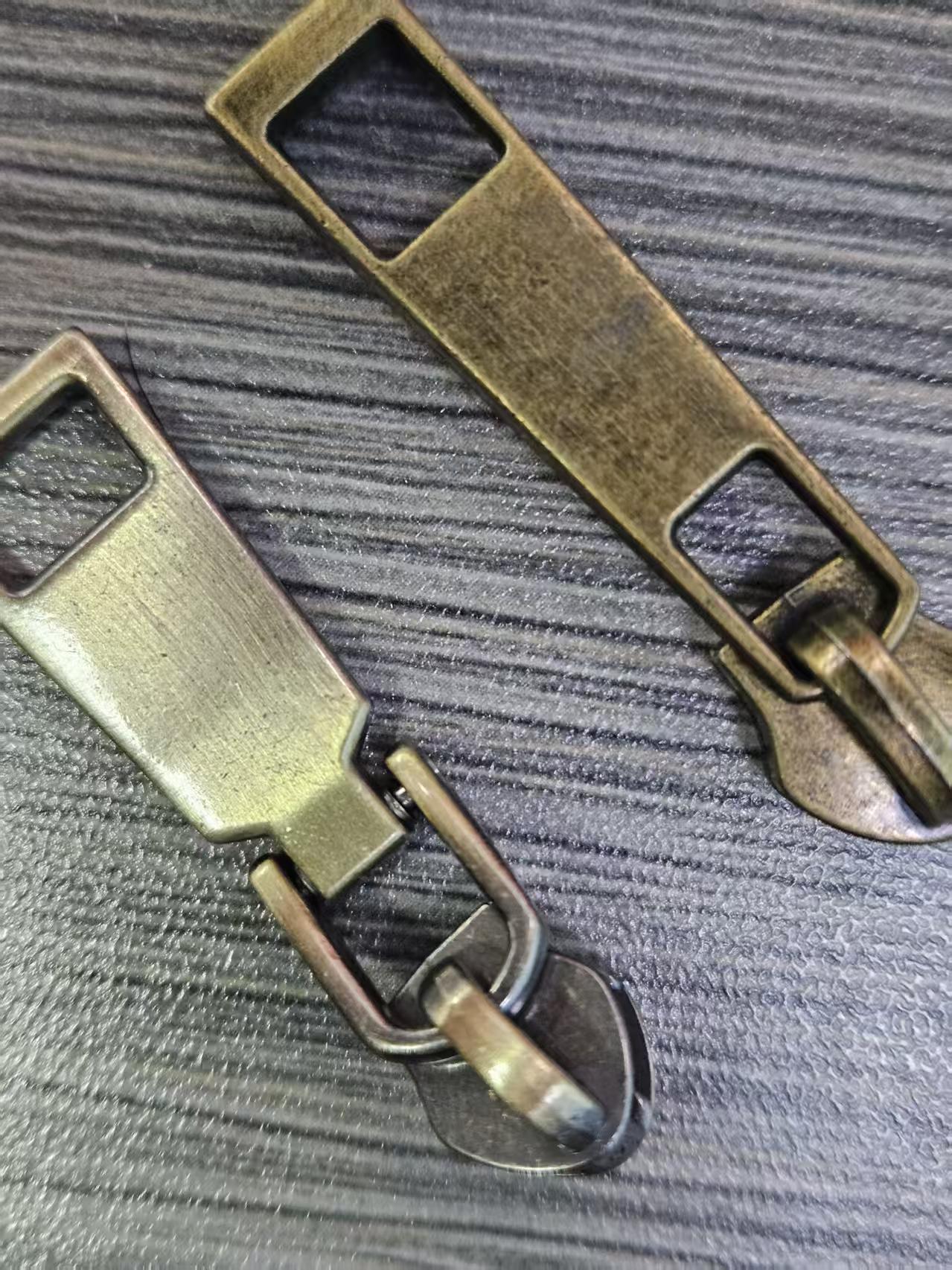 manufacturer wholesale price custom logo 3# 5 # 7# zipper puller head multiple styles metal zipper slider for clothing bag (复制) manufacturer wholesale price custom logo 3# 5 # 7# zipper puller head multiple styles metal zipper slider for clothing bag (复制)