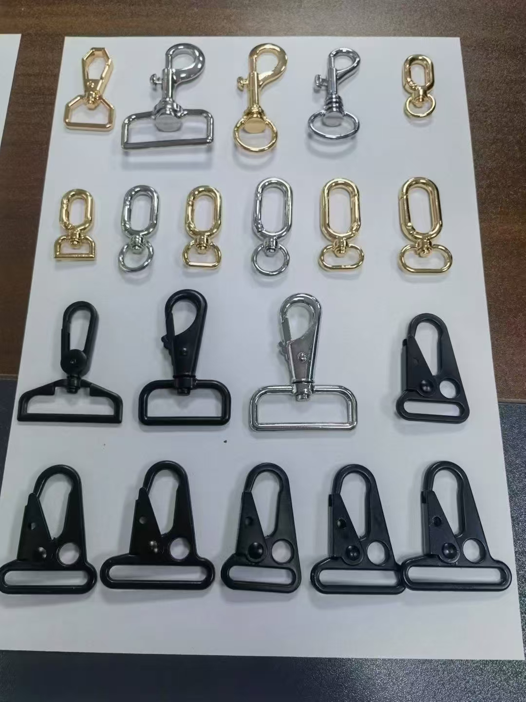 zinc alloy snap hook for pet cage doors | nickel plated with anti rust coating | easy to operate trigger zinc alloy snap hook for pet cage doors | nickel plated with anti rust coating | easy to operate trigger